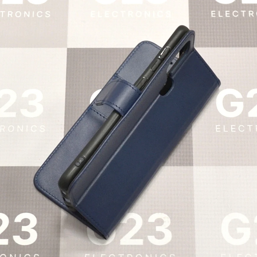 Diary Mate dėklas-knygutė Samsung Galaxy A21s telefonui (tamsiai mėlynos spalvos) 6 Diary Mate dėklas-knygutė Samsung Galaxy A21s tamsiai mėlynos spalvos – užverstas dėklas su telefonu kitu kampu