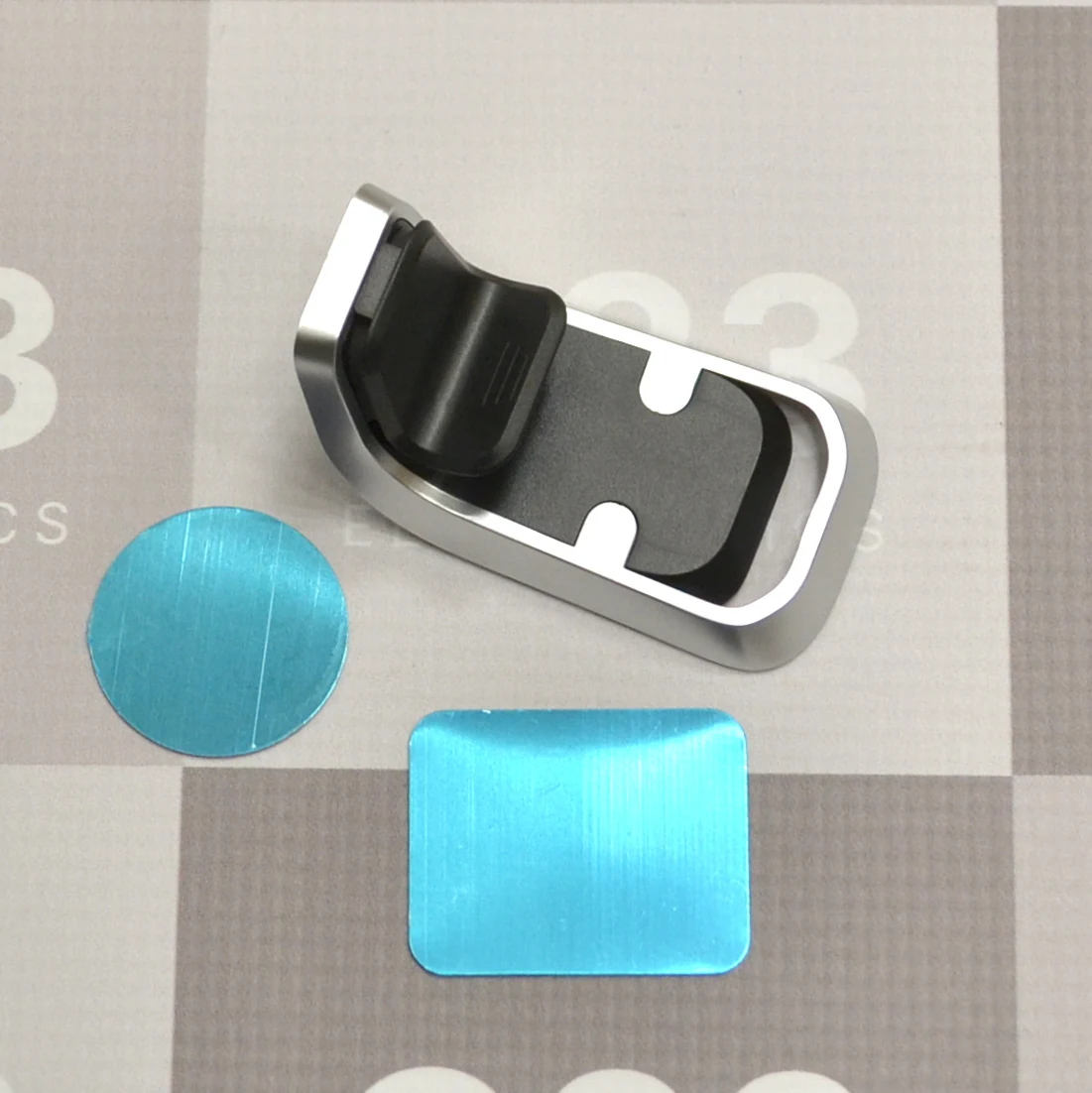 Prie grotelių tvirtinamas magnetinis auto laikiklis telefonui Hoco Duck CA74 8 Magnetinis laikiklis Hoco CA74 su apvalia ir stačiakampe metalinėmis plokštelėmis
